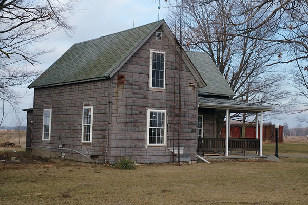 Farm house with old siding, Marshall County