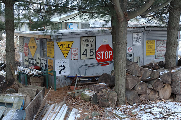 Shed decorated with signs, Pulaski County
