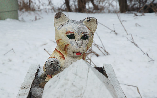 Cat decorating a mailbox, Wolcottville