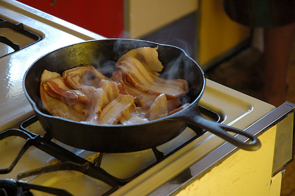 Sunday morning, frying bacon, Jake's studio