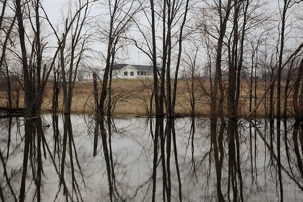 Cloudy day, reflection and house, Walkerton