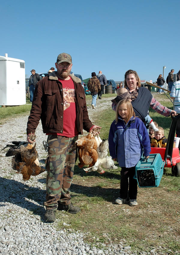 Family leaving with chickens, Animal Swap Meet, Ligonier