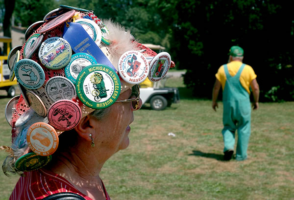 Woman with festival button hat, Mill Creek Days