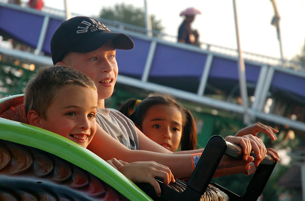 Alex riding the Dragon Rollercoaster, St. Joe County Fair